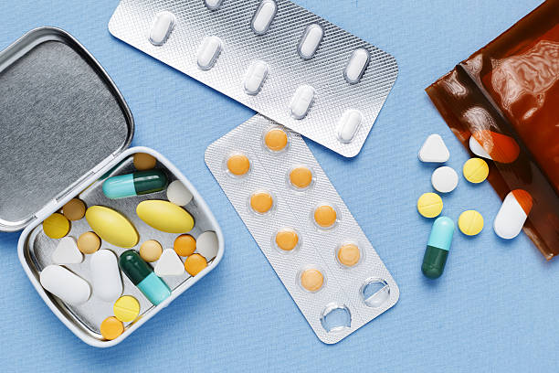 Pills on blue background